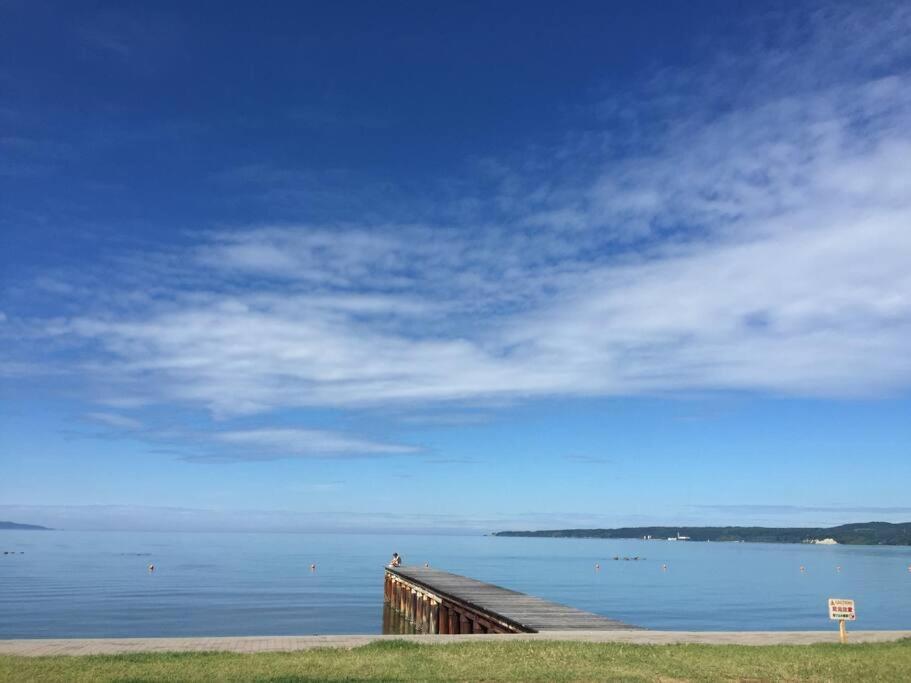 佐渡 ビーチまで0分 1客のみ オーシャンビュー Beach Side House ウッドデッキ Sado Εξωτερικό φωτογραφία